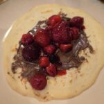 Thin homemade crepes filled with fruit and nutella
